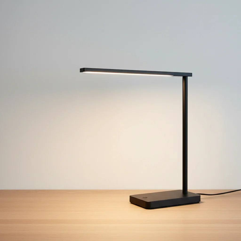 Smart LED Desk Lamp with adjustable brightness and built-in wireless charging station on a desk